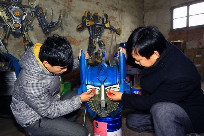 giant transformers built from car parts